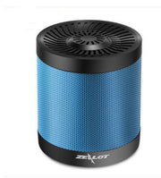 Blue and black cylindrical speaker with 'Zealot' branding on a white background